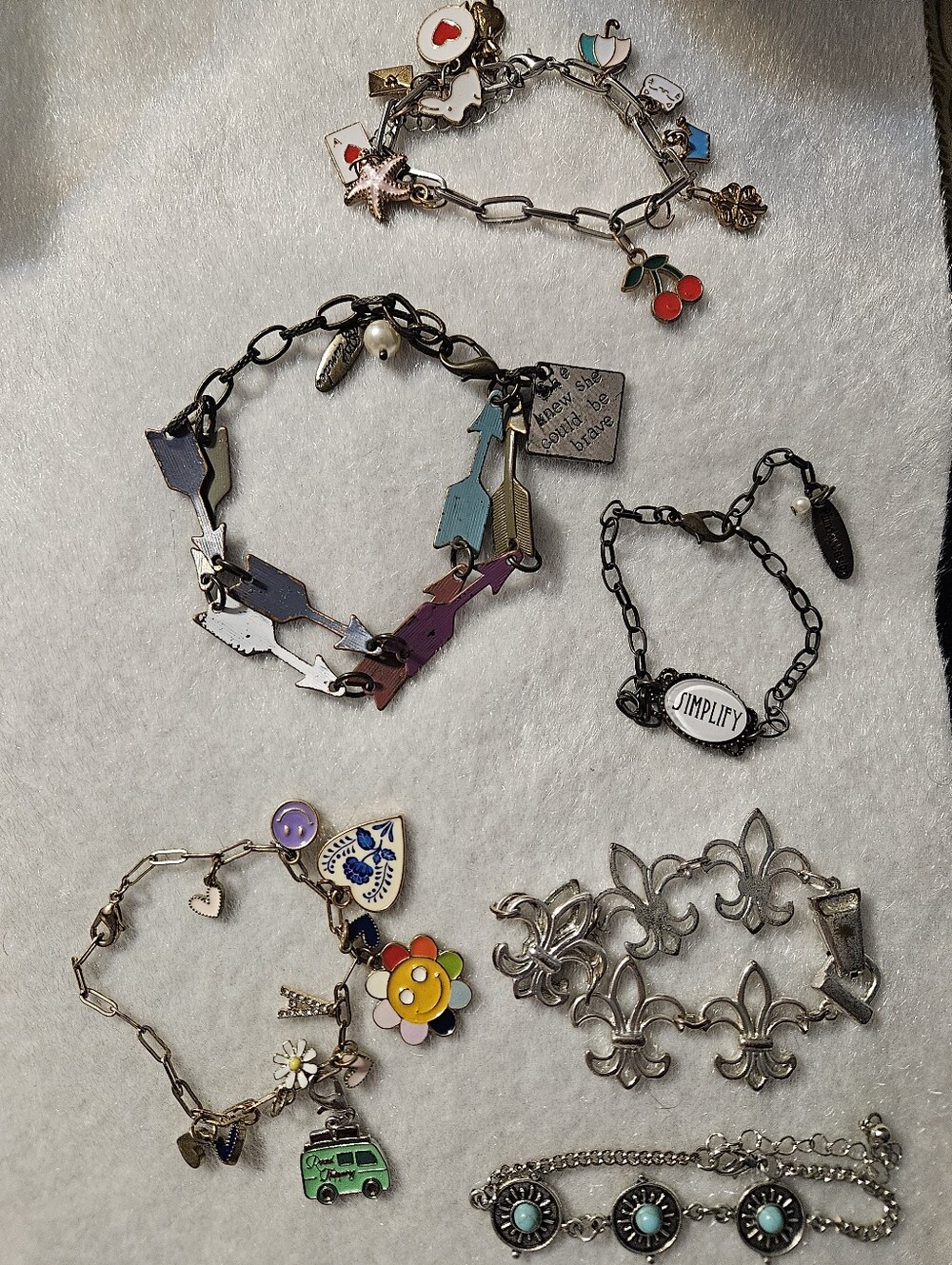Various Metal And Charm Bracelets
